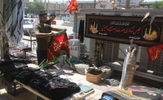 بازار شهرستان زلزله زده سرپلذهاب به استقبال ماه محرم رفت / ازعرضه محصولات عزاداری تا سیاه پوش شدن بازار شهرستان