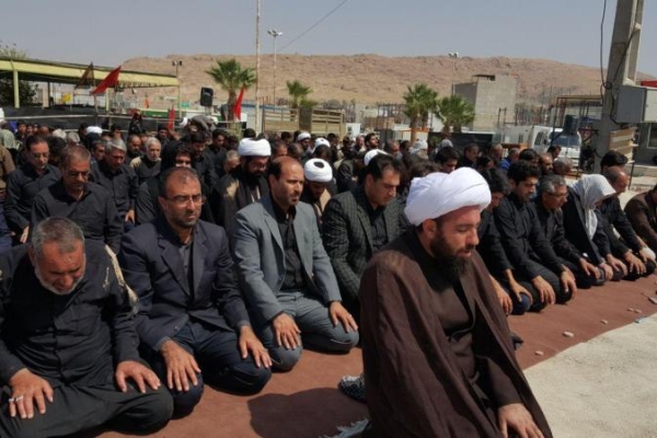 اقامه نمازجماعت ظهر عاشورا درجوار مزار مطهر احمدابن اسحاق (ره) سرپلذهاب / انجام معروف ترین معروفها به تاسی از شهید راه امر به معروف ونهی ازمن