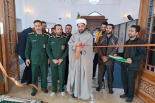 نمایشگاه فرهنگی عکس و پوستر در حرم احمد ابن اسحاق(ره) سرپل ذهاب به مناسبت هفته بسیج