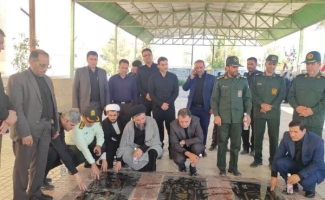 مراسم غبار روبی در مزار شهدای شهرستان سرپل‌ذهاب برگزار شد