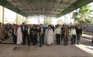 آیین غبارروبی و عطر افشانی مزار شهدای احمد ابن اسحاق (ره) سرپل ذهاب بمناسبت گرامیداشت هفته دفاع مقدس