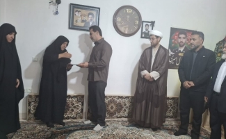 تجدید میثاق با آرمان‌های شهدا در دیدار با خانواده امیری و پهلوانی در سرپل‌ذهاب