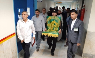 حضور کاروان خورشید آستان قدس رضوی به همراه پرچم رضوی در شهرستان سرپل ذهاب