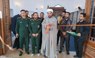 نمایشگاه فرهنگی عکس و پوستر در حرم احمد ابن اسحاق(ره) سرپل ذهاب به مناسبت هفته بسیج