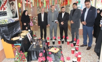 برپایی نمایشگاه عکس و پوستر به مناسبت چهارمین سالگرد شهید حاج قاسم سلیمانی در دبستان دخترانه ۱۷ شهریور سرپل ذهاب