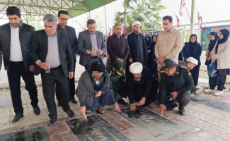 در گرامیداشت هفته بسیج مزار شهدای احمد بن اسحاق گلباران شد