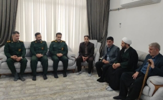 دیدار مسئولان سپاه و ورزش و جوانان سرپل‌ذهاب با خانواده شهید سامان پادام